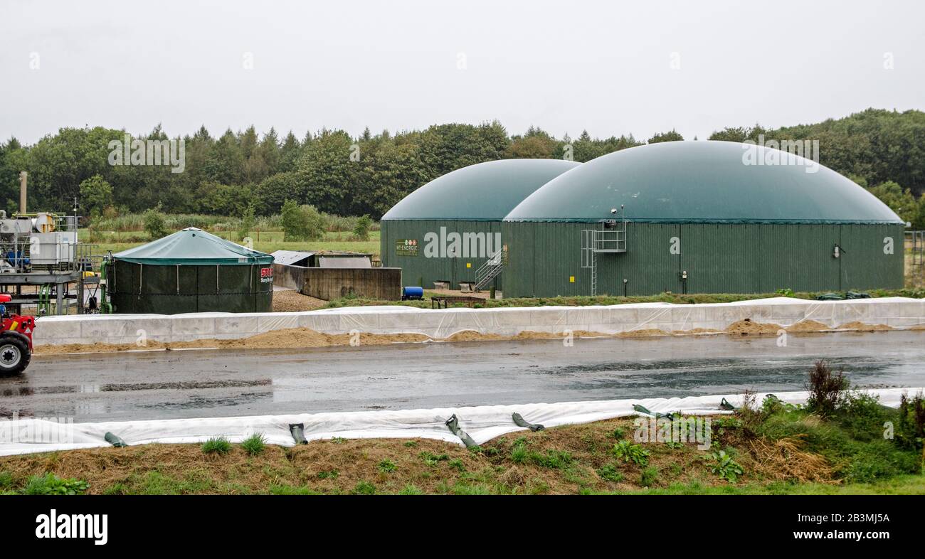 Basingstoke, UK - September 23, 2019:  Two anaerobic digesters which turn waste food into gas for energy on a rainy day at the Herriard Bio Power Plan Stock Photo