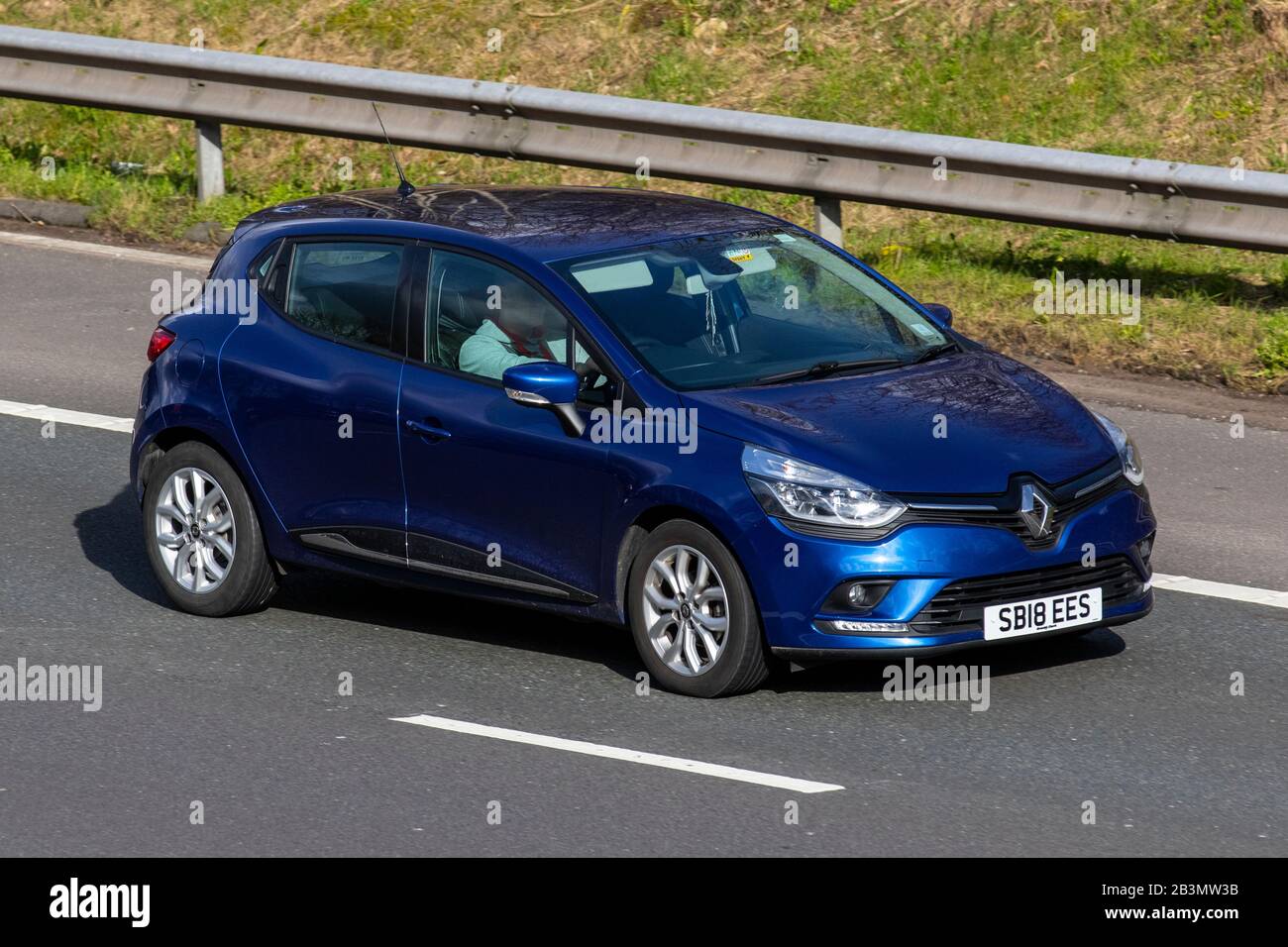 2018 blue Renault Clio Dynamique NAV TCE; Vehicular traffic, transport, modern vehicles, saloon cars, vehicle on UK roads, motors, motoring on the M6 motorway Stock Photo