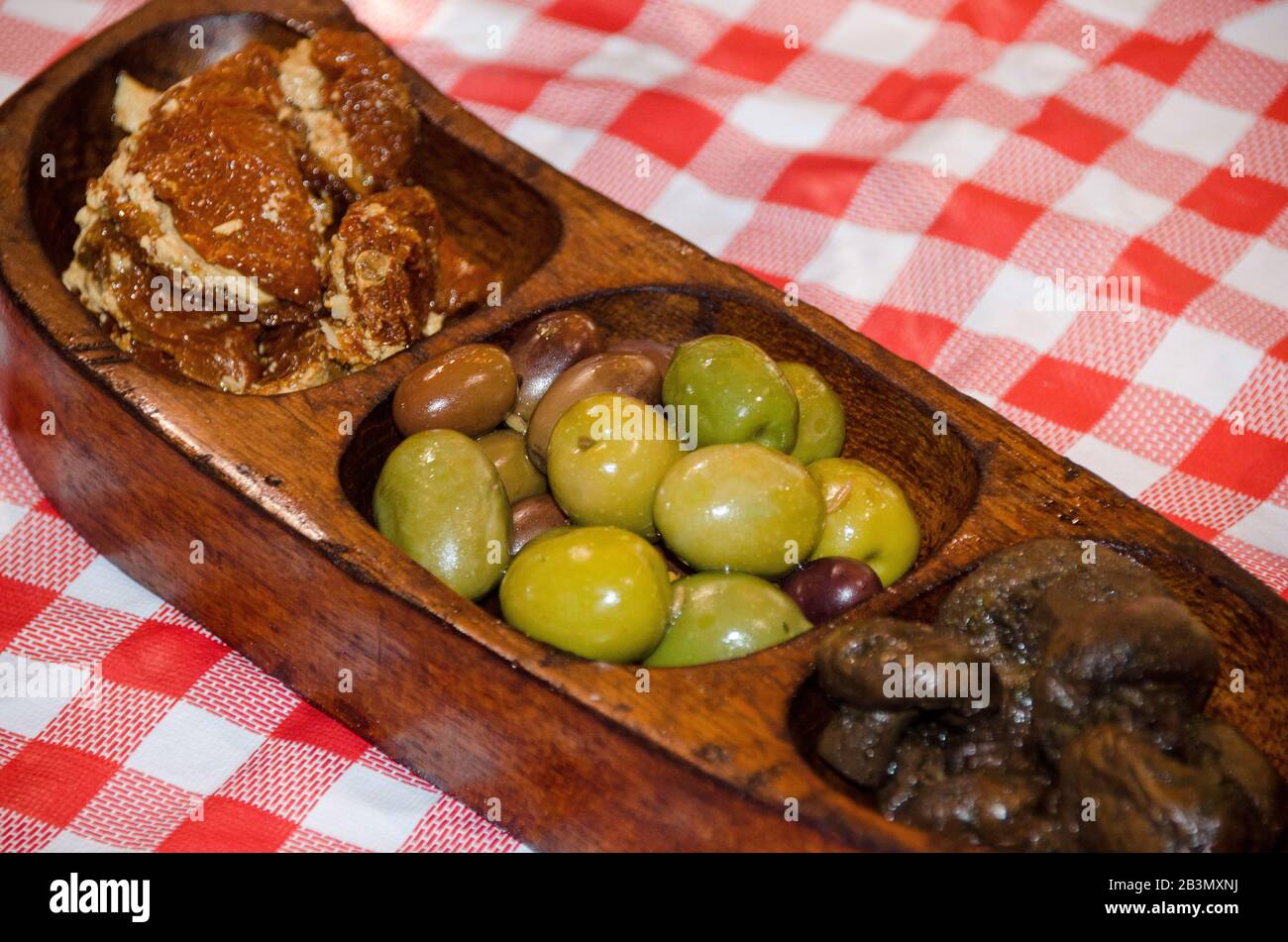 Bowls of Green and black olives served as appetizers Stock Photo Alamy