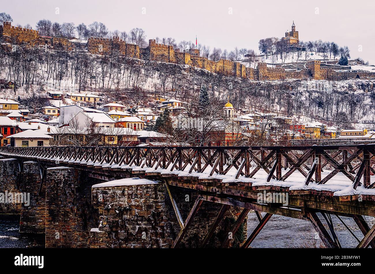 Tsaravets fortress Veliko Tarnovo, former medieval capital of Bulgaria and Bishops bridge over the River Yantra in winter,BG Stock Photo