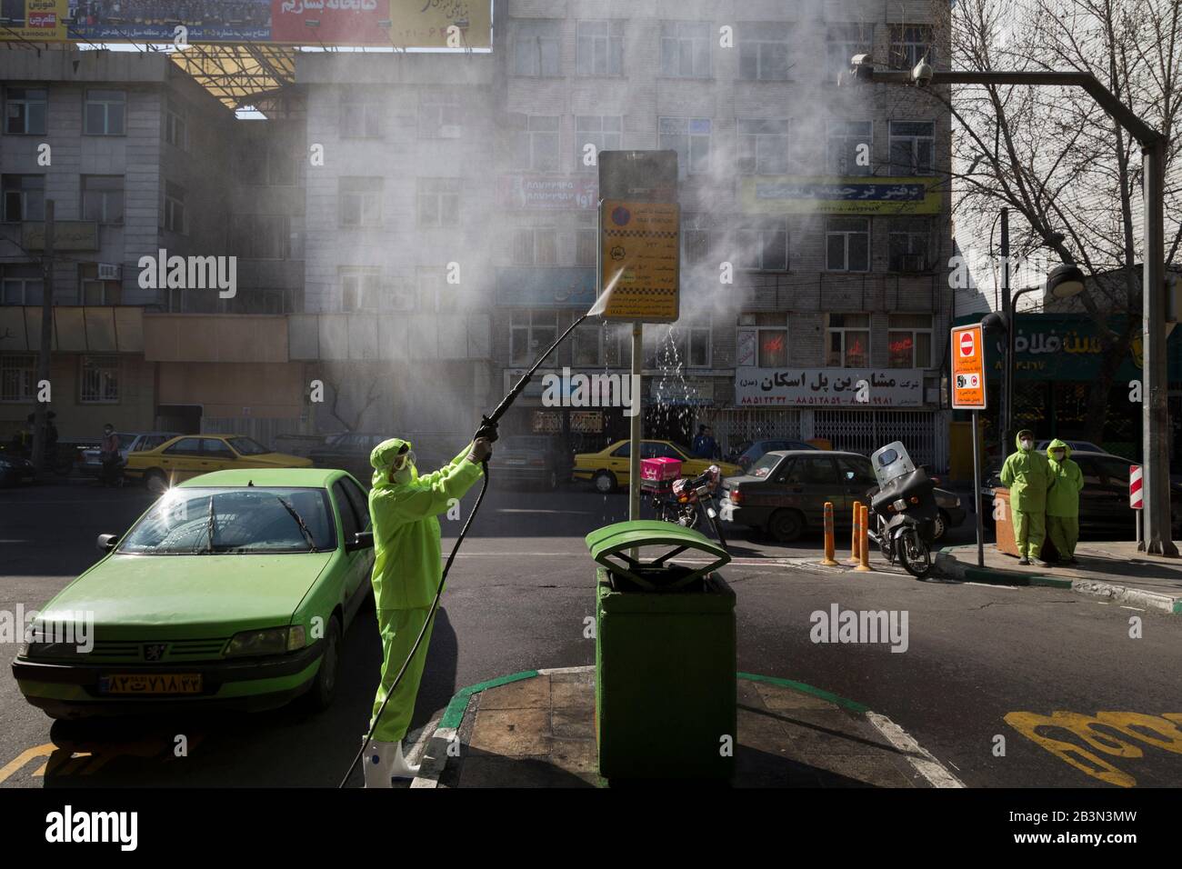 Tehran, Iran. 5th Mar, 2020. Iranian firefighters and municipality workers disinfect a street because of the new coronavirus (COVID-19) in northern Tehran, Iran. Iran today reported 15 new deaths from the novel coronavirus and 591 fresh cases in the past 24 hours, bringing the toll to 107 dead and 3,513 infected. Iran has one of the highest death tolls in the world from the new coronavirus outside of China, the epicenter of the outbreak. Credit: Rouzbeh Fouladi/ZUMA Wire/Alamy Live News Stock Photo