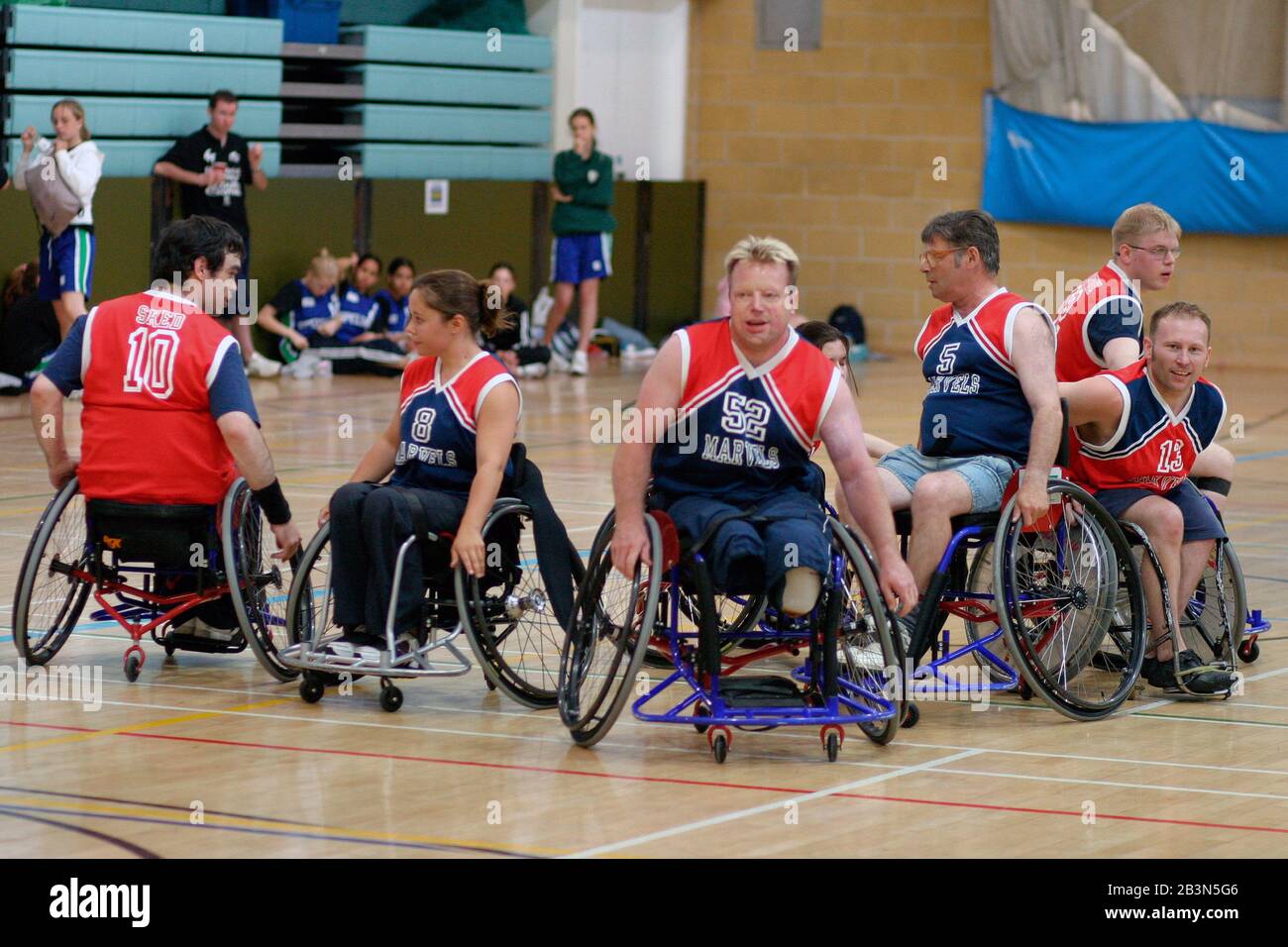 Wheelchair users playing basketball UK Stock Photo Alamy