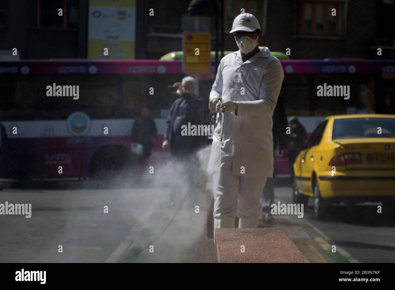 Tehran, Iran. 5th Mar, 2020. Iranian firefighters and municipality workers disinfect a street because of the new coronavirus (COVID-19) in northern Tehran, Iran. Iran today reported 15 new deaths from the novel coronavirus and 591 fresh cases in the past 24 hours, bringing the toll to 107 dead and 3,513 infected. Iran has one of the highest death tolls in the world from the new coronavirus outside of China, the epicenter of the outbreak. Credit: Rouzbeh Fouladi/ZUMA Wire/Alamy Live News Stock Photo