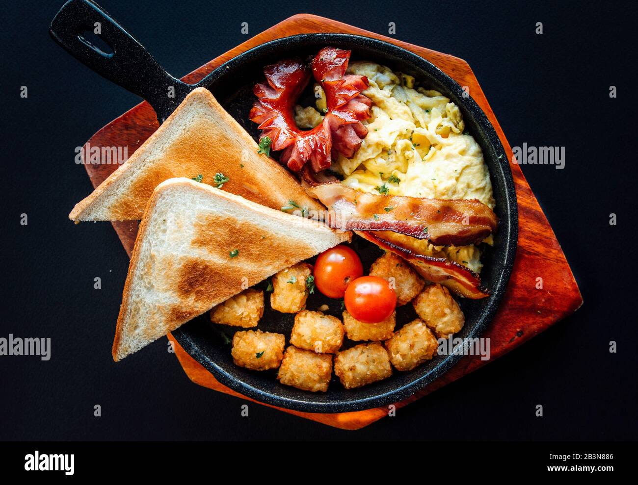 American style breakfast on a wooden plate Stock Photo Alamy