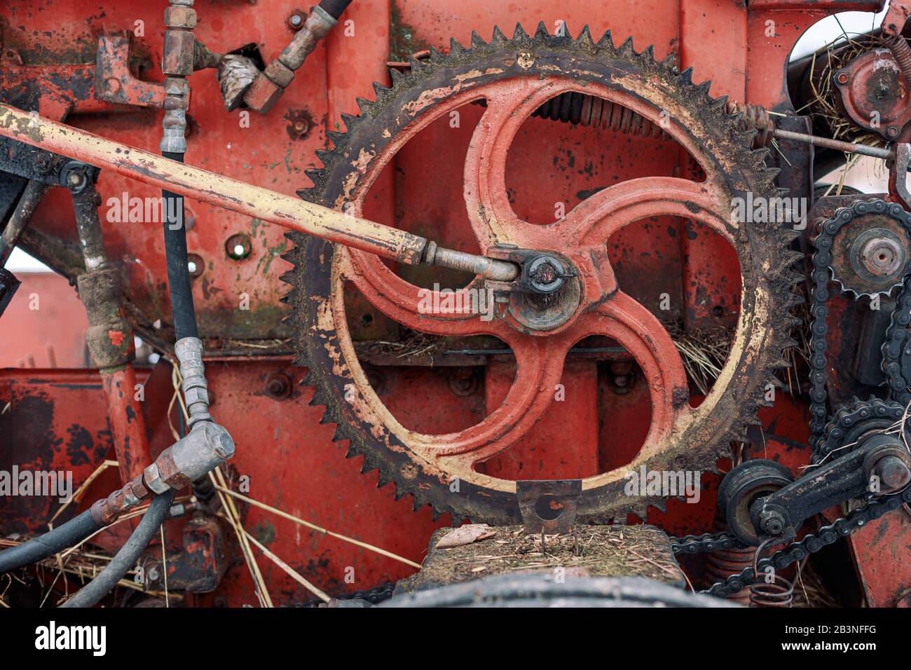 Old rusty farm equipment agricultural combine mechanism Stock Photo