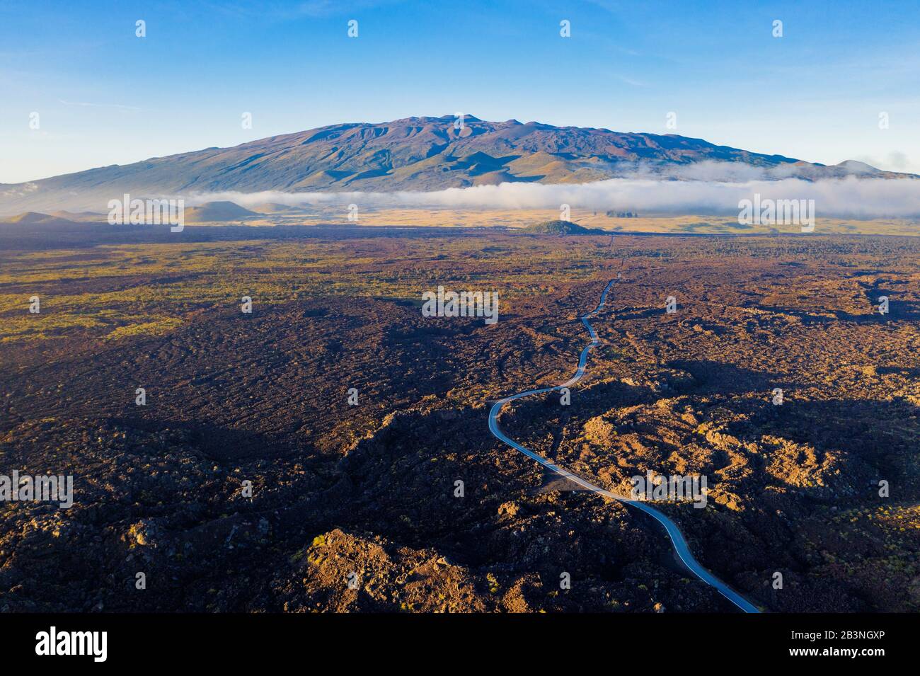 Aerial view of volcanic landscape and Mauna Kea, 4207m, Big Island, Hawaii, United States of America, North America Stock Photo