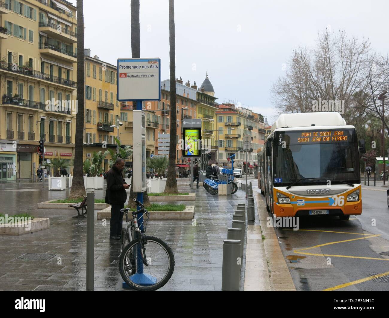 A grey morning on the Promenade des Arts in central Nice and a bus for Cap  Ferrat waits at the bus-stop, but there are few pedestrians about Stock  Photo - Alamy