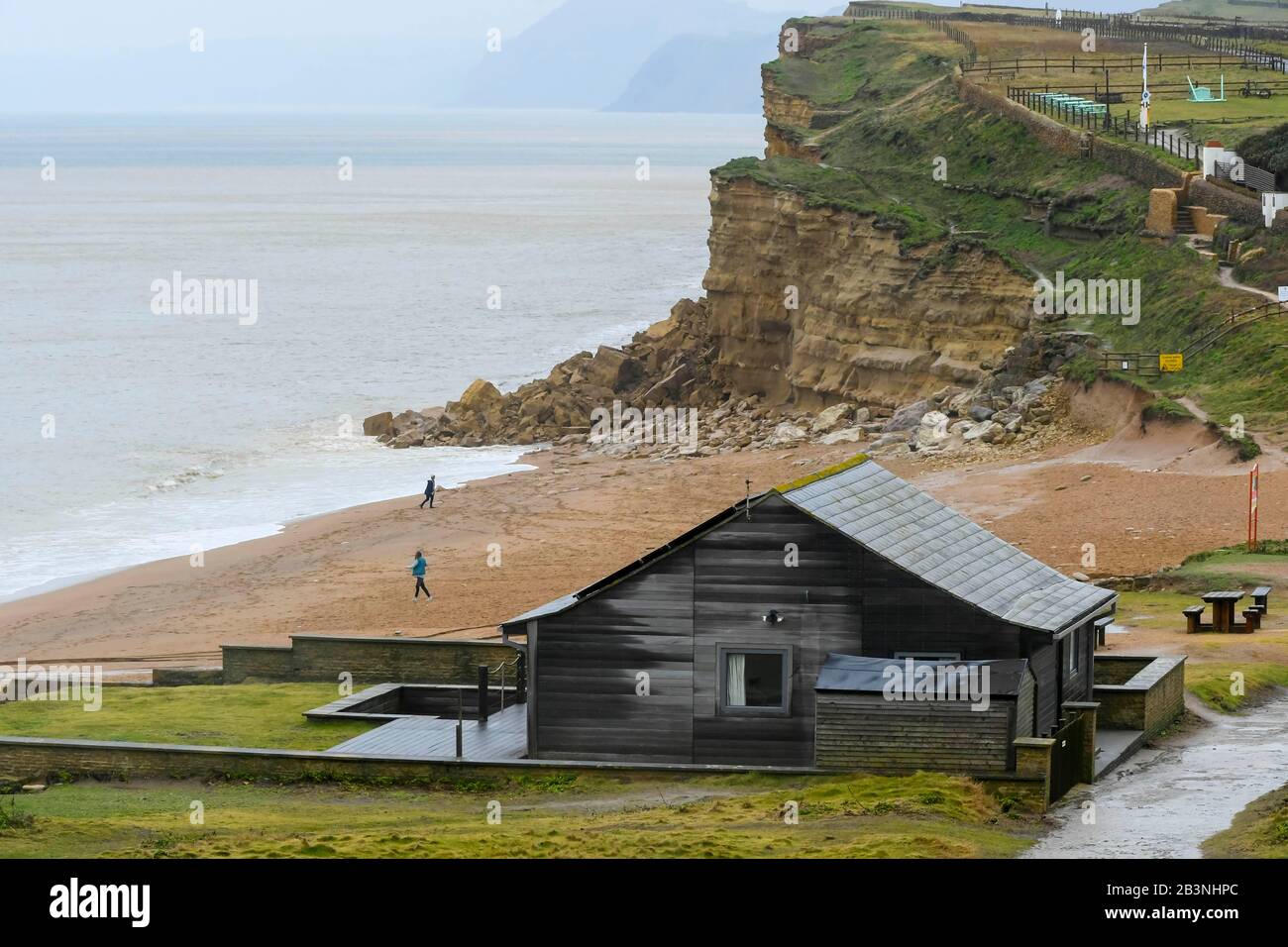 Hive Beach, Burton Bradstock, Dorset, UK.  5th March 2020.  UK Weather.  A section of cliff at Hive beach at Burton Bradstock in Dorset has collapsed after heavy rain during the morning caused the rockfall.  It is estimated that 600 tonnes of rock fell during the landslide. Picture Credit: Graham Hunt/Alamy Live News Stock Photo