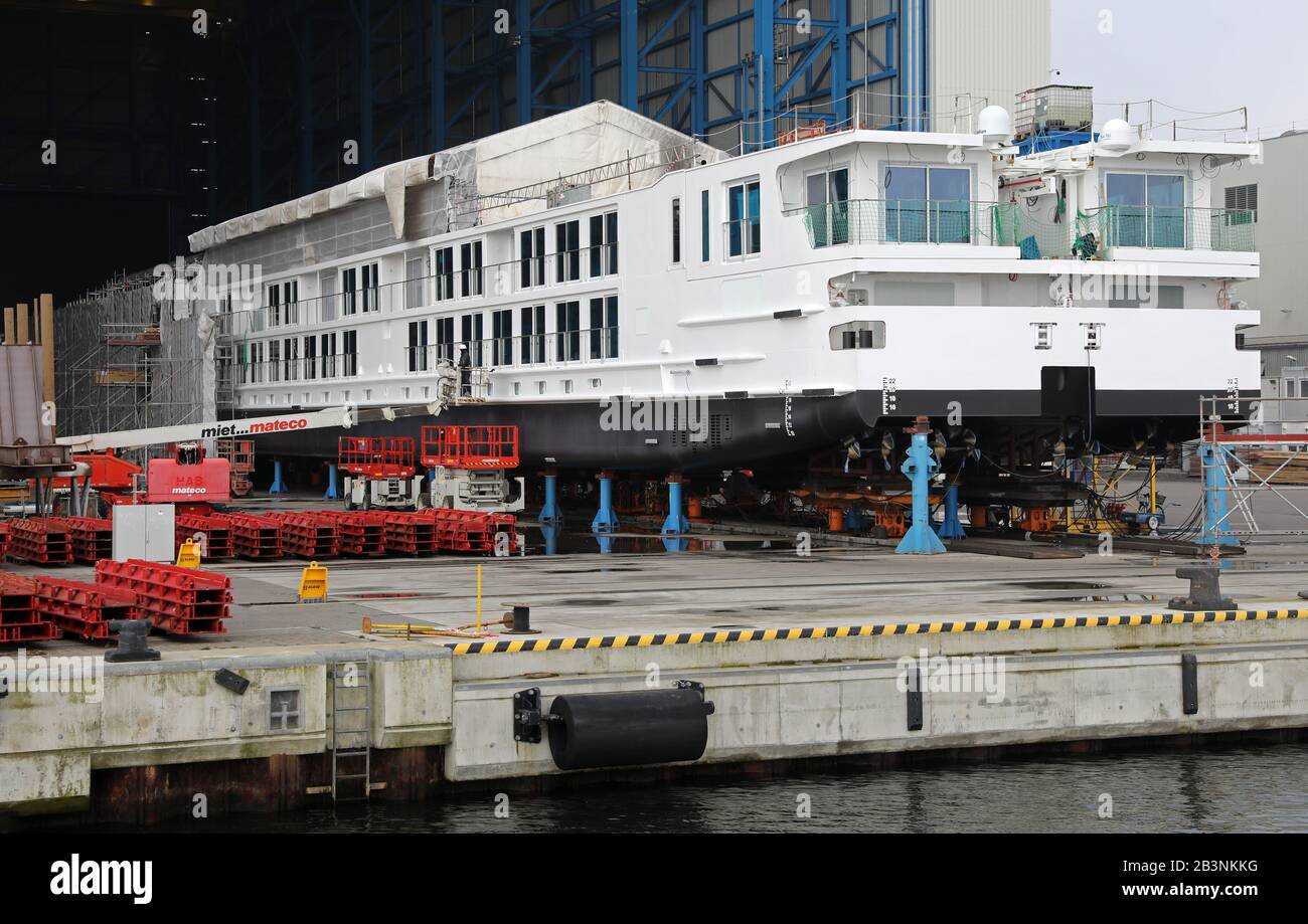 Rostock, Germany. 05th Mar, 2020. A river cruise ship is under