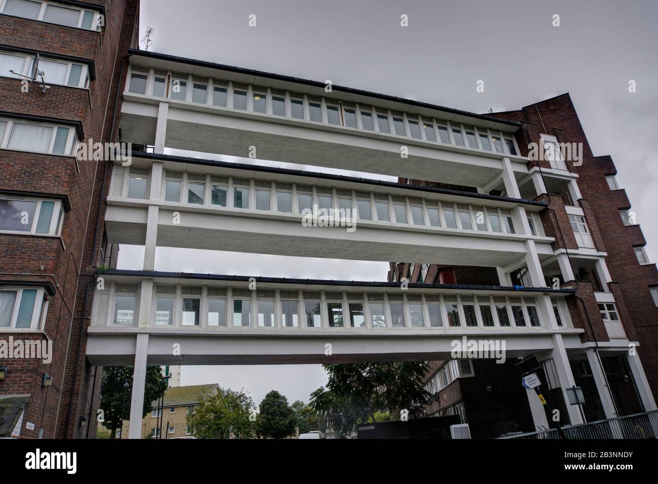 Deptford, London, United Kingdom - October 12, 2019: Inter-apartment block communal bridges on three levels on the Pepys estate. Stock Photo