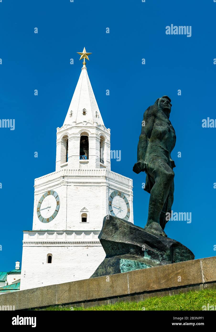 Statue of Musa Calil and the Spasskaya Tower of Kazan Kremlin in Russia Stock Photo