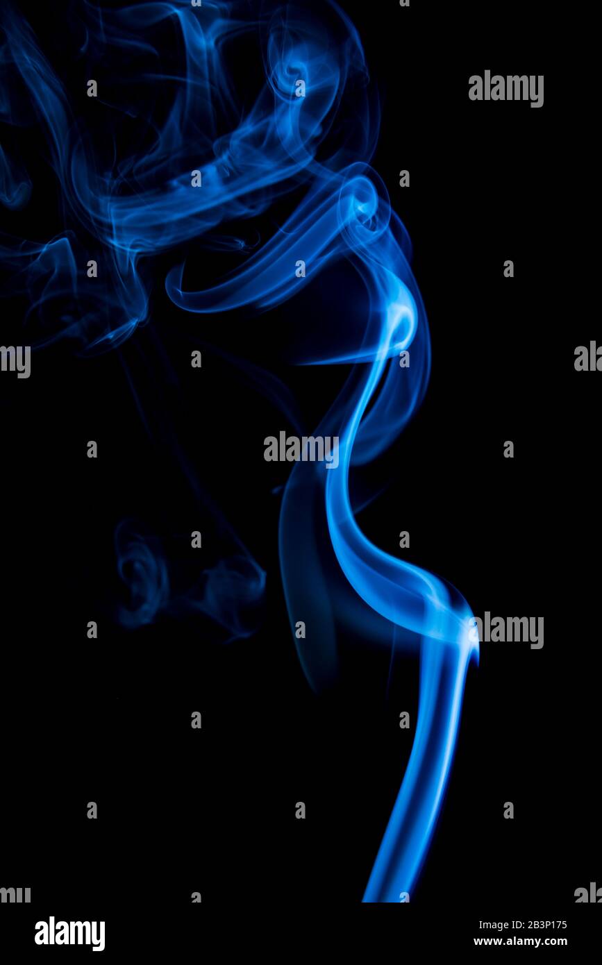 Abstract shape of blue smoke on black background. Stock Photo