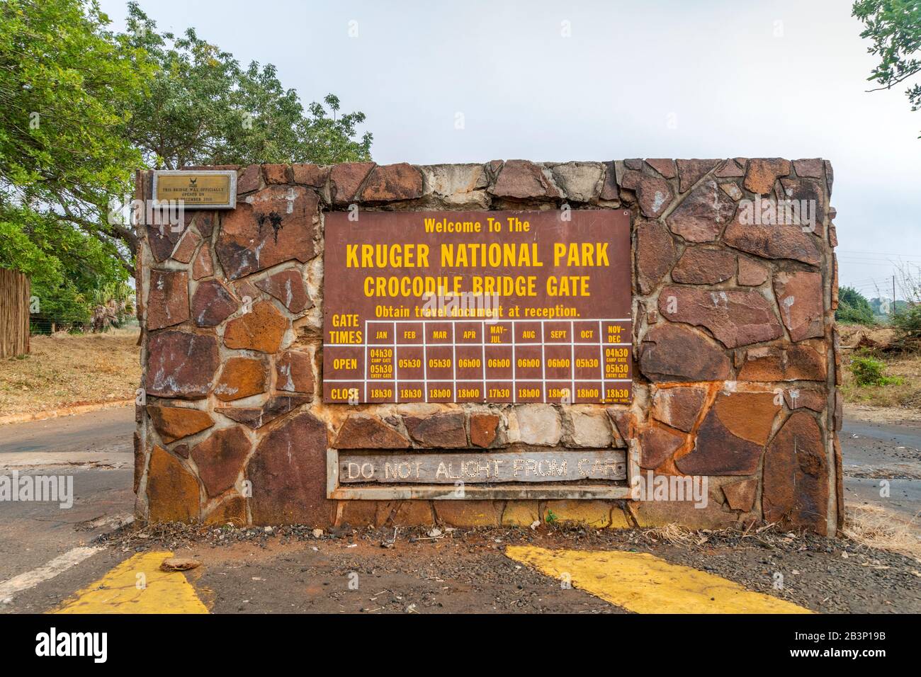 Kruger National Park, South Africa - May 17,2019: Crocodile Bridge Gate with opening hours to Kruger National Park, South Africa Stock Photo