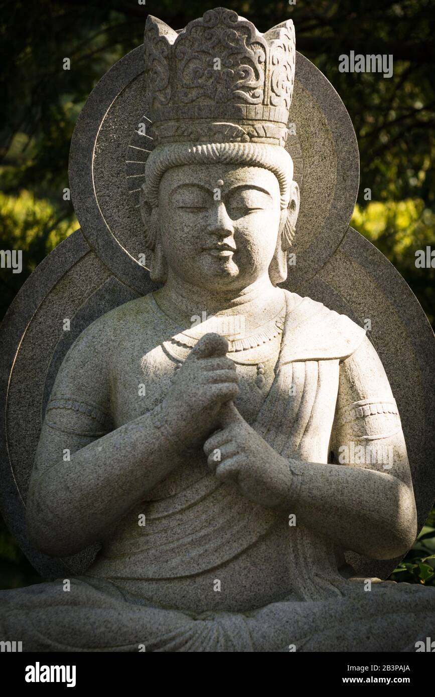 Buddha statue within Daisho-in Temple complex , said to be one of the most prestigious Shingon temples in the western part of Japan. Miyajima Island Stock Photo