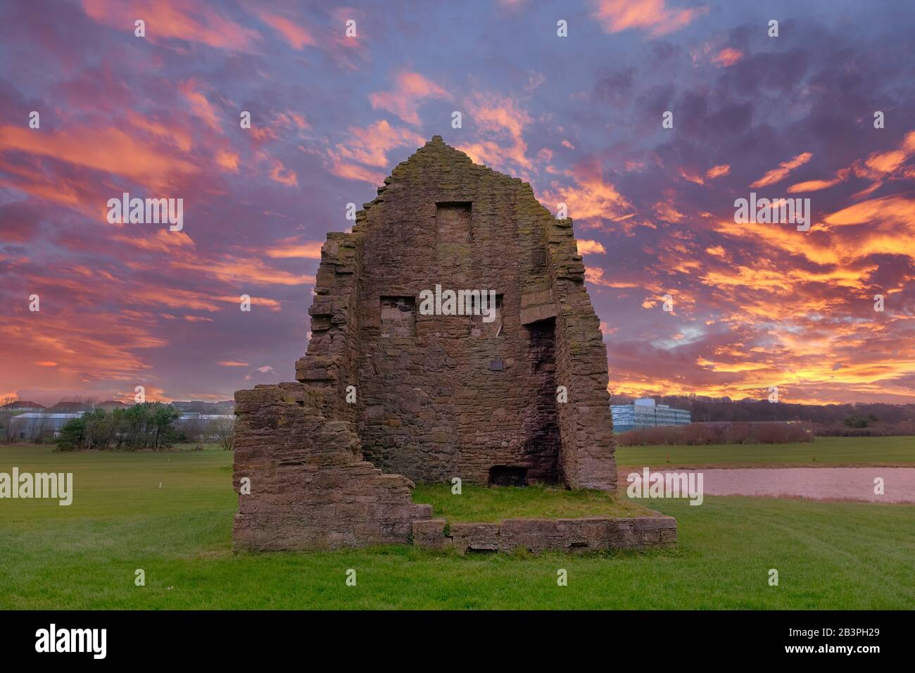 The remains of the old Engine House that served Auchenharvie Colliery in the Ayrshire town of Ardeer in Stevenston North Ayrshire Scotland at the suns Stock Photo