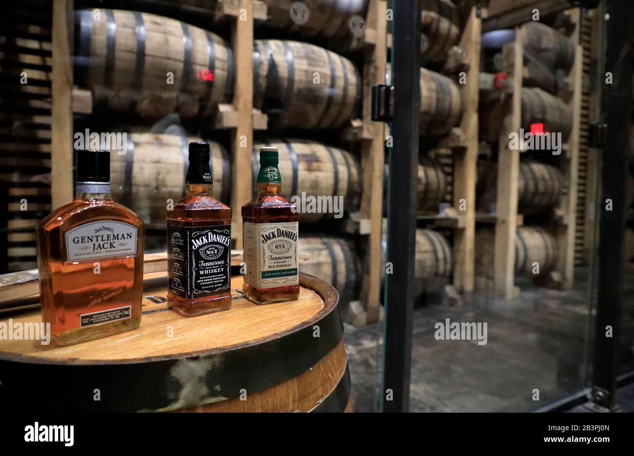 A bottle of Gentleman Jack, Jack Daniel No.7 and Jack Daniels Rye whiskey display in tasting barrelhouse of Jack Daniel's Distillery. Lynchburg.Tennessee.USA Stock Photo