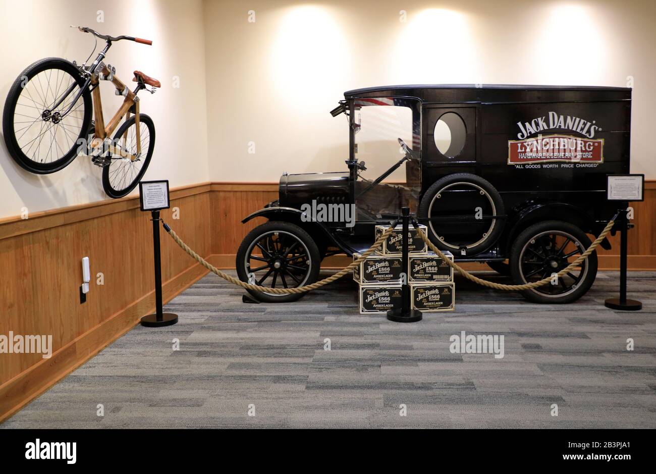 An old Jack Daniel delivery truck display side by side a modern