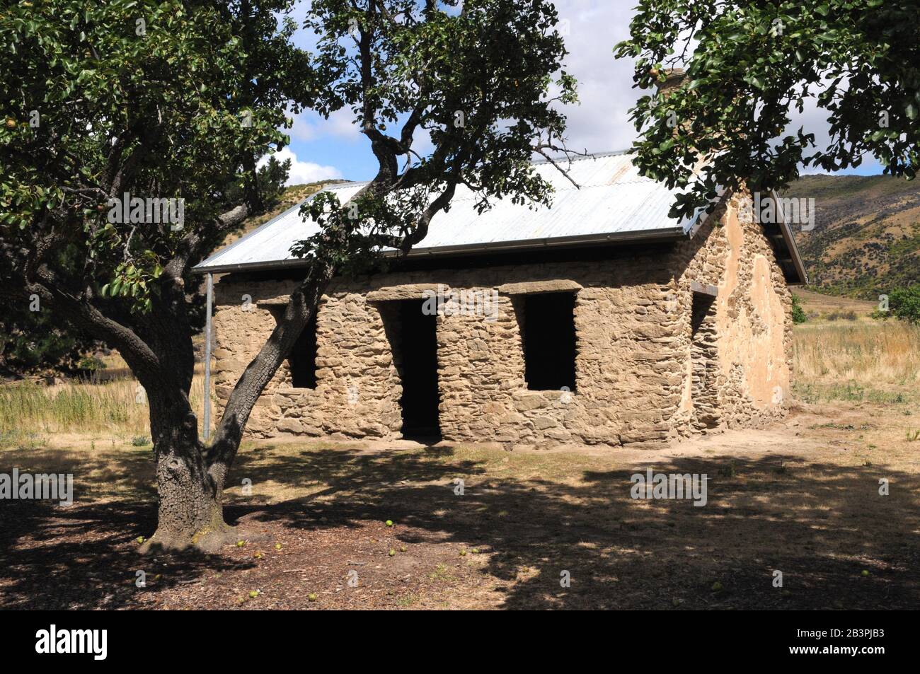 Restored miner's cottage on the site of Stewart Town built on the plateau of the Menzies Terrace above the old gold workings. Stock Photo