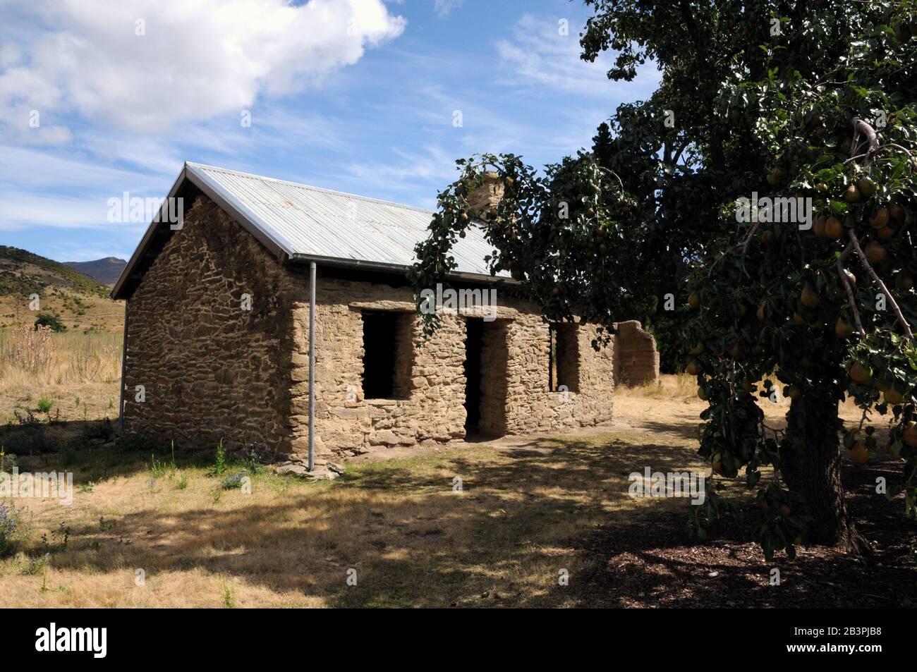 Restored miner's cottage on the site of Stewart Town built on the plateau of the Menzies Terrace above the old gold workings. Stock Photo