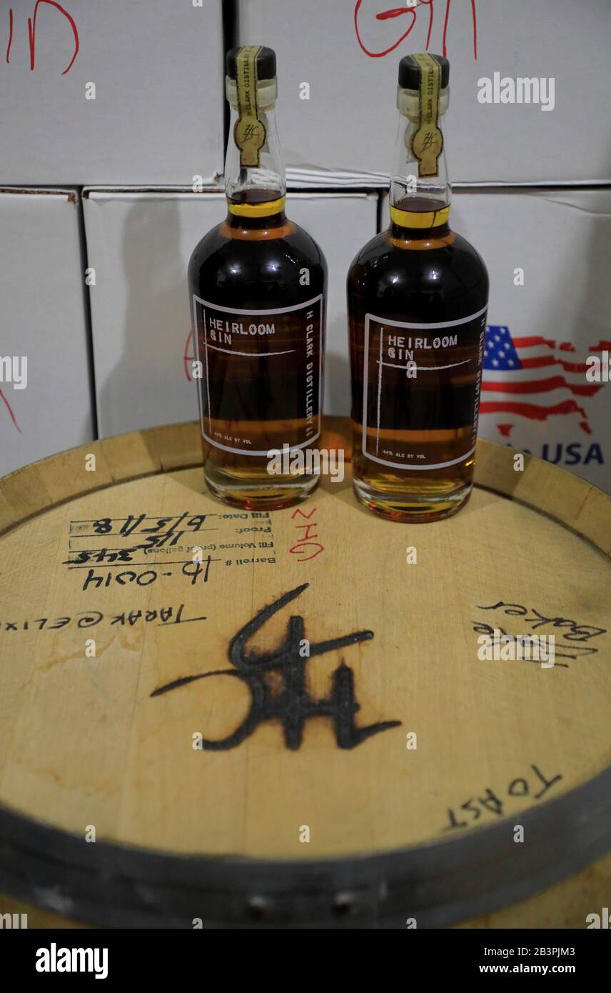 Small batch hand-crafted gins on a barrel top.H Clark Distillery.W.Thompson's Station.Tennessee.USA Stock Photo