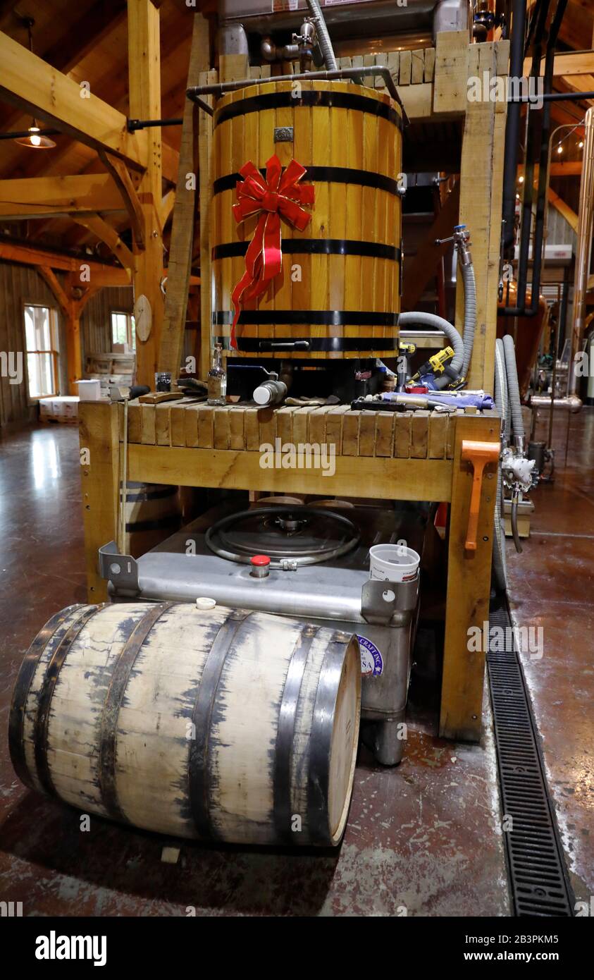 Wooden barrel contain Charcoal filter for filtering Bourbon whiskey in Leiper's Fork Distillery.Franklin.Tennessee.USA Stock Photo
