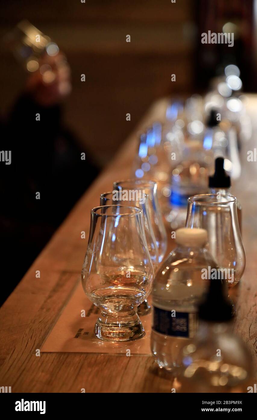 Tasting glasses contain whiskey on the table of tasting room of Leiper's Fork Distillery.Franklin.Tennessee.USA Stock Photo