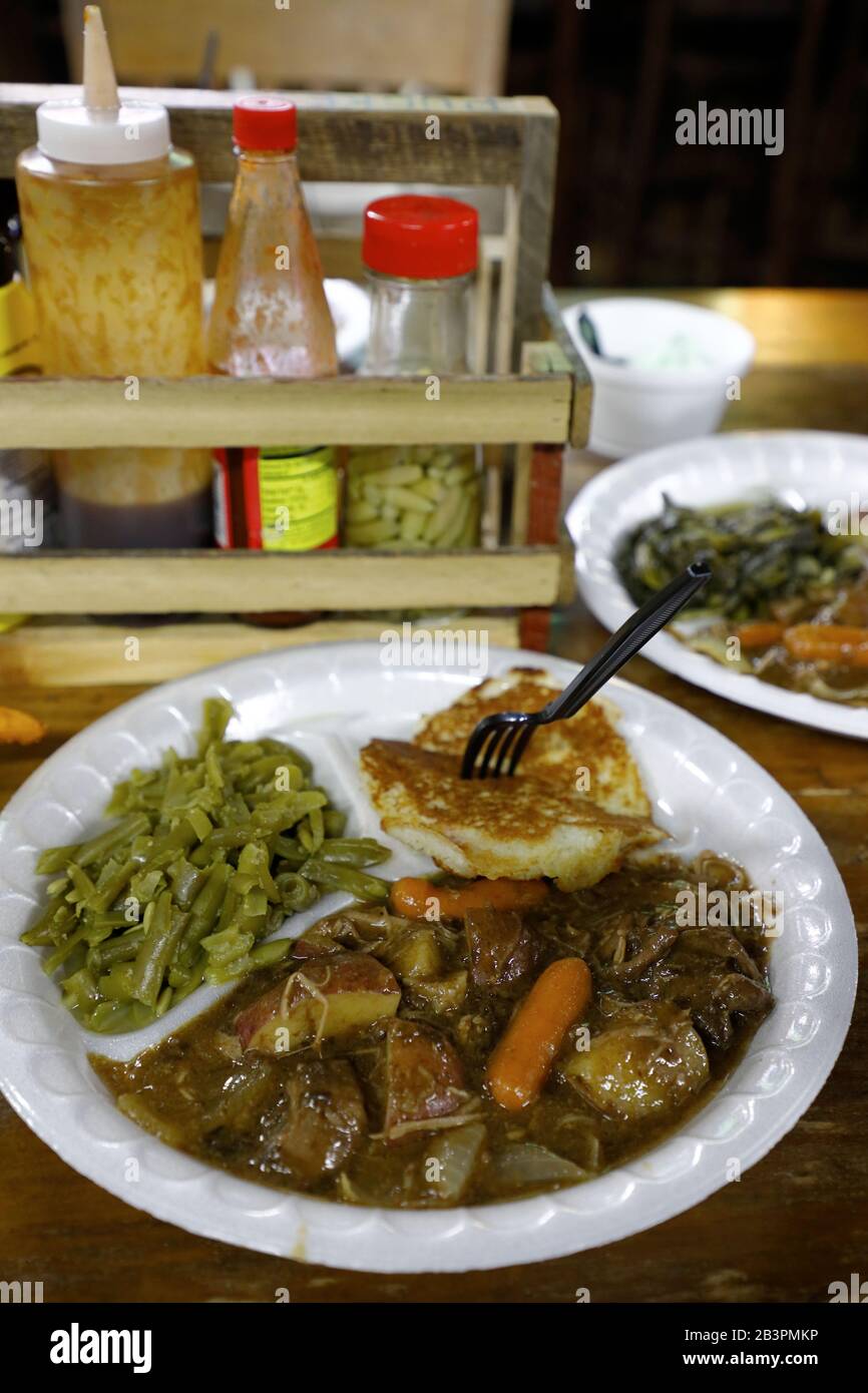 Traditional souther meal (green beans beef stew and sausage) served in Puckett's Grocery & Restaurant.Leiper's Fork.Tennessee.USA Stock Photo