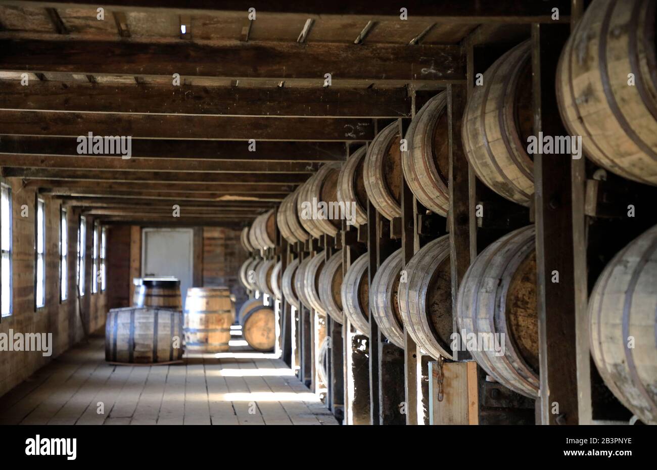 Whiskey barrels stored in traditional warehouse rack house in Barton 1792 distillery.Bardstown.Kentucky.USA Stock Photo