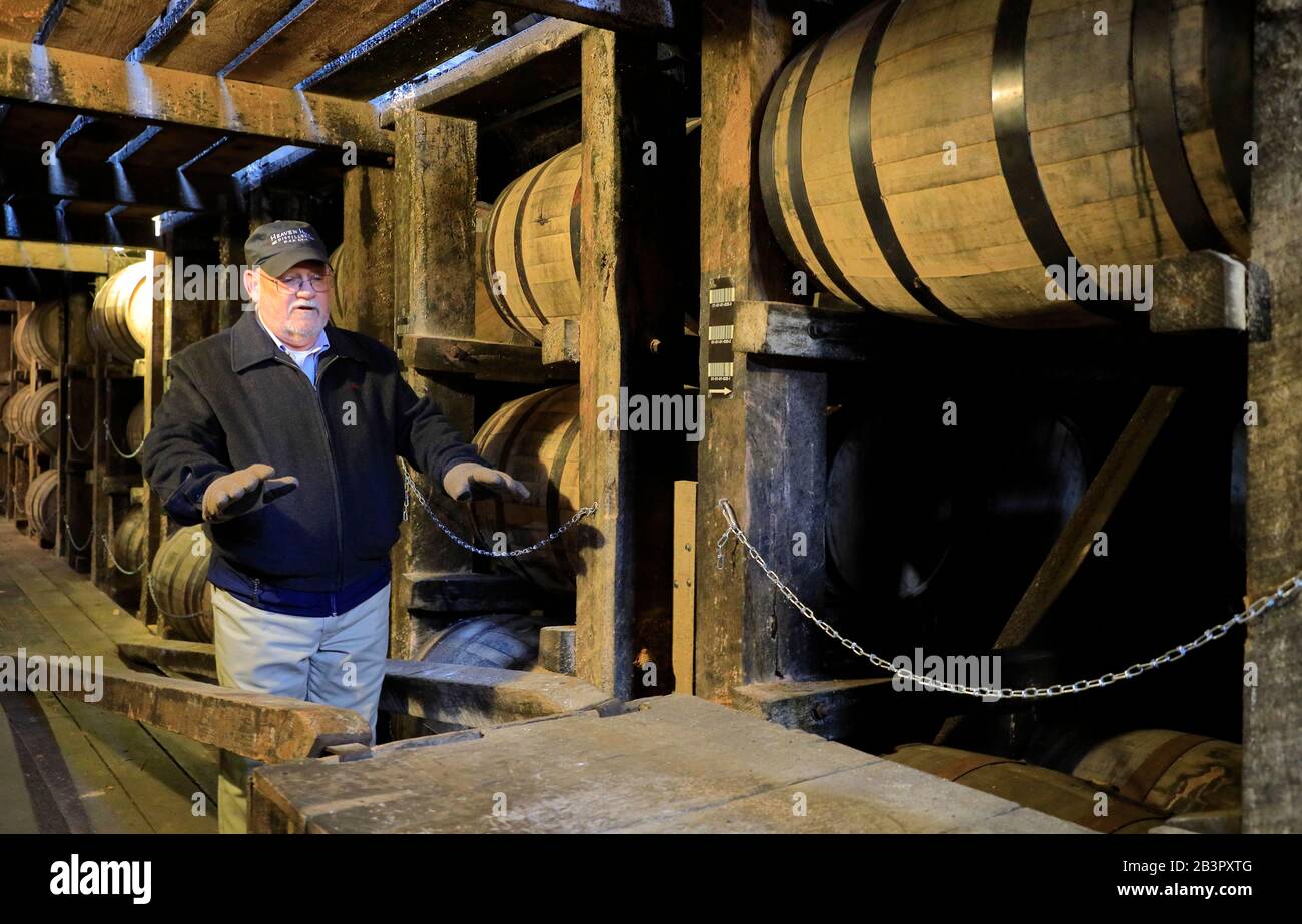 Tour guide introduce the Bourbon whiskey maturation process inside the rickhouse/rackhouse of Heaven Hill Distillery.Bardstown.Kentucky.USA Stock Photo