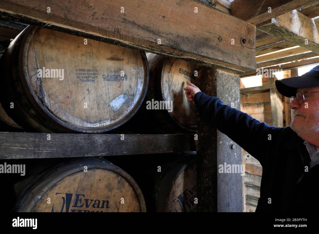 Tour guide introduce the Bourbon whiskey maturation process inside the rickhouse/rackhouse of Heaven Hill Distillery.Bardstown.Kentucky.USA Stock Photo