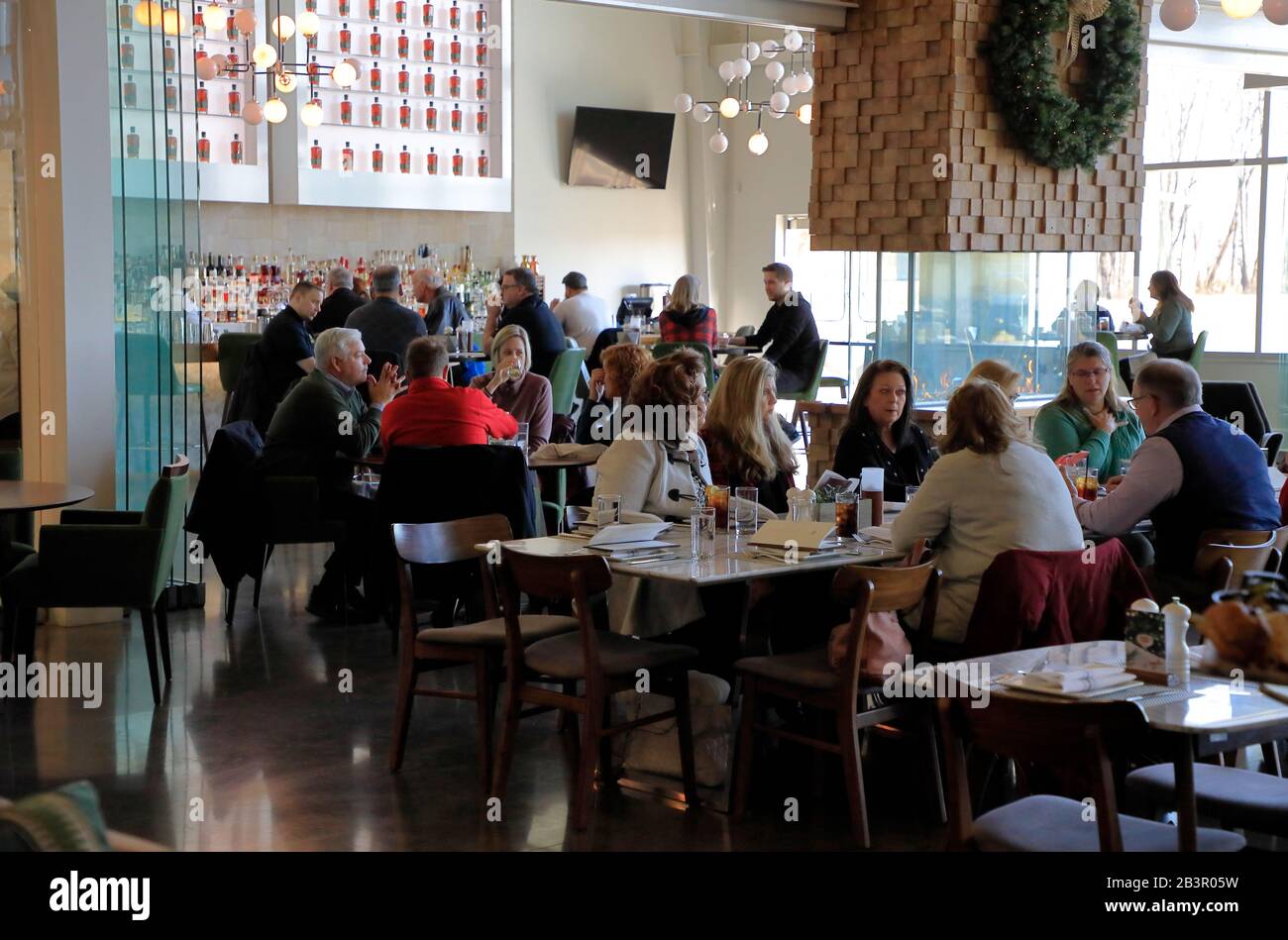 Customers inside of Bottle & Bond Kitchen and Bar a New American style