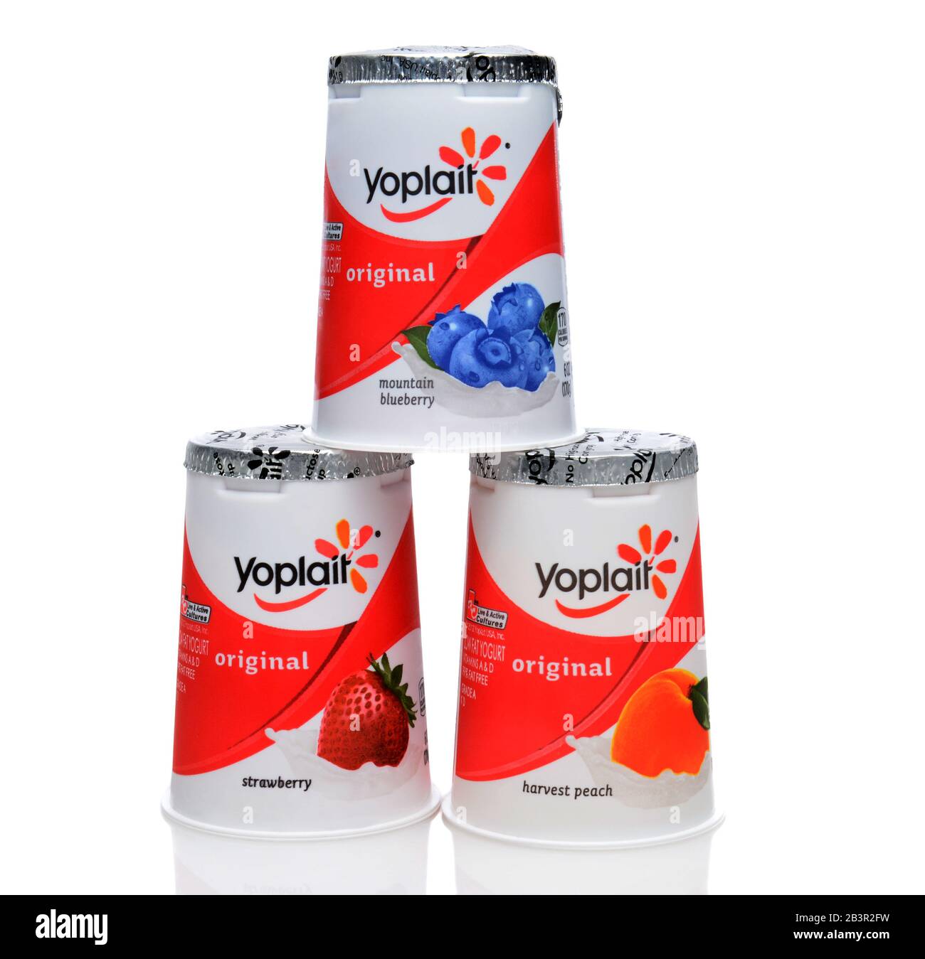 IRVINE, CA - SEPTEMBER 15, 2014: Three different containers of Yoplait Original Yogurt. In 1965, two French dairy co-operatives, Yola and Coplait, mer Stock Photo