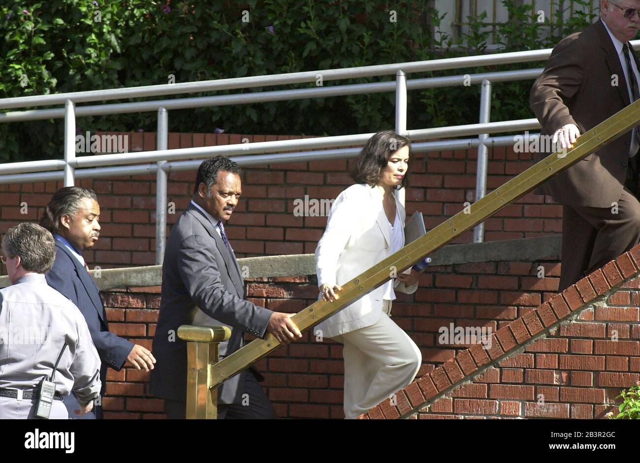 Huntsville, Texas 22JUN00 USA: Witnesses to the execution of convicted murderer Gary Graham walk towards the Walls Unit of the Texas Department of Corrections facility: (from left) Rev. Al Sharpton,  Rev. Jesse Jackson and Bianca Jagger. Demonstrators on both sides of the capital punishment debate protested outside the unit  ©Bob Daemmrich Stock Photo
