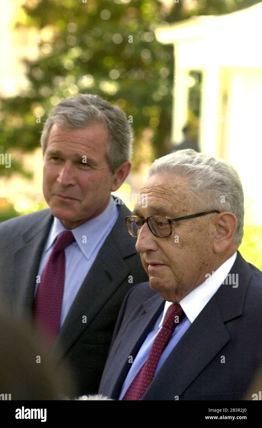 Austin, Texas USA, July 31 2000:  Former Secretary of State Henry Kissinger and Republican presidential candidate George W. Bush speak to reporters after an hour-long meeting at the Governor's Mansion, talking about foreign policy in a possible Bush administration. ©Bob Daemmrich Stock Photo