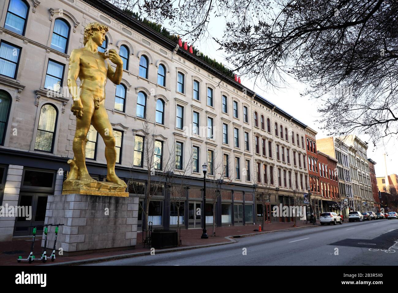 The gold statue of David outside of 21c Museum Hotel by Serkan Ozkaya