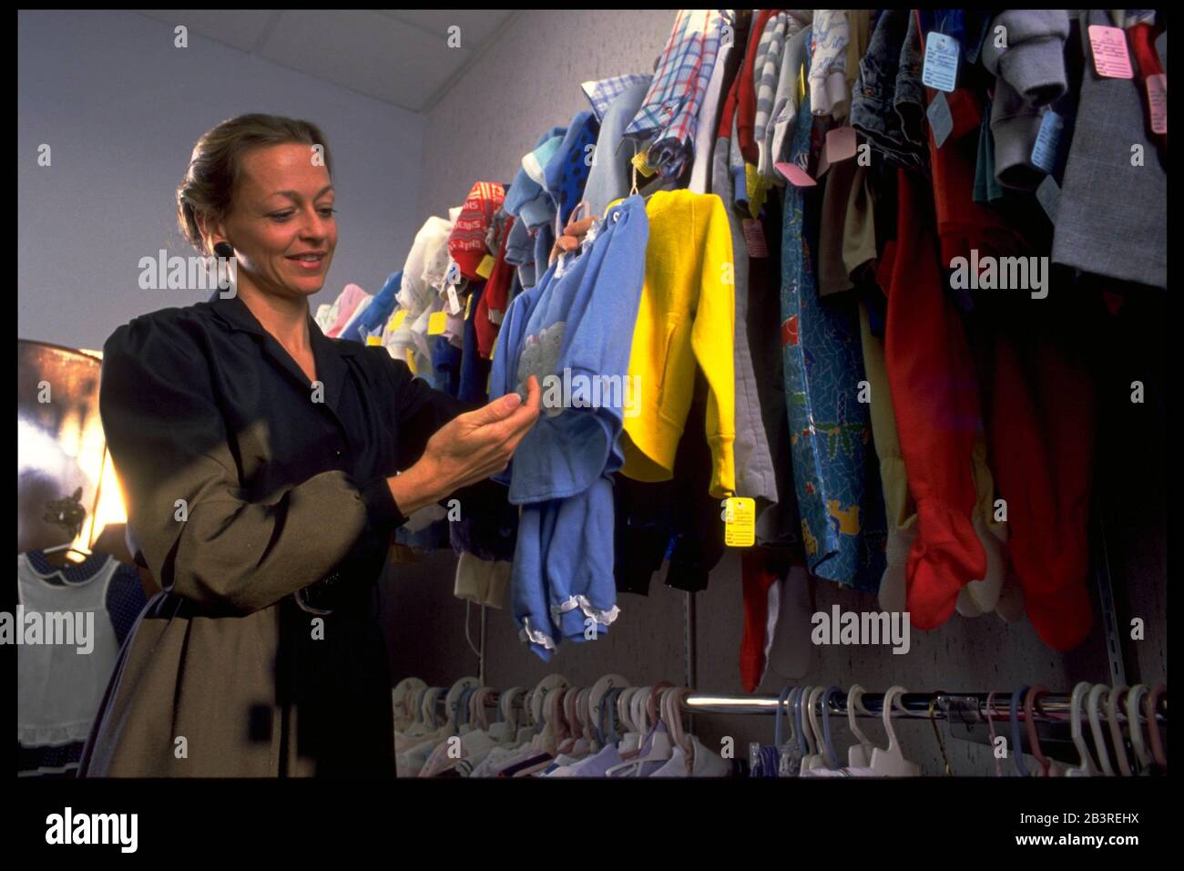 Austin Texas USA, circa 1989 Owner of children's clothing consignment