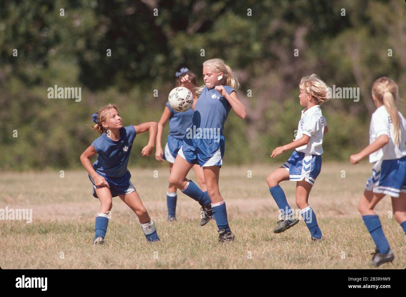 Austin Texas USA, circa 1995 Girls soccer teams play in a youth league