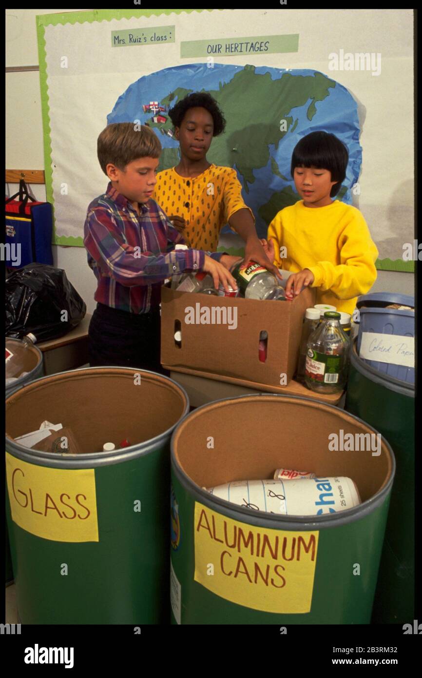 Austin Texas USA, circa 1988 Sixthgrade students sort trash into