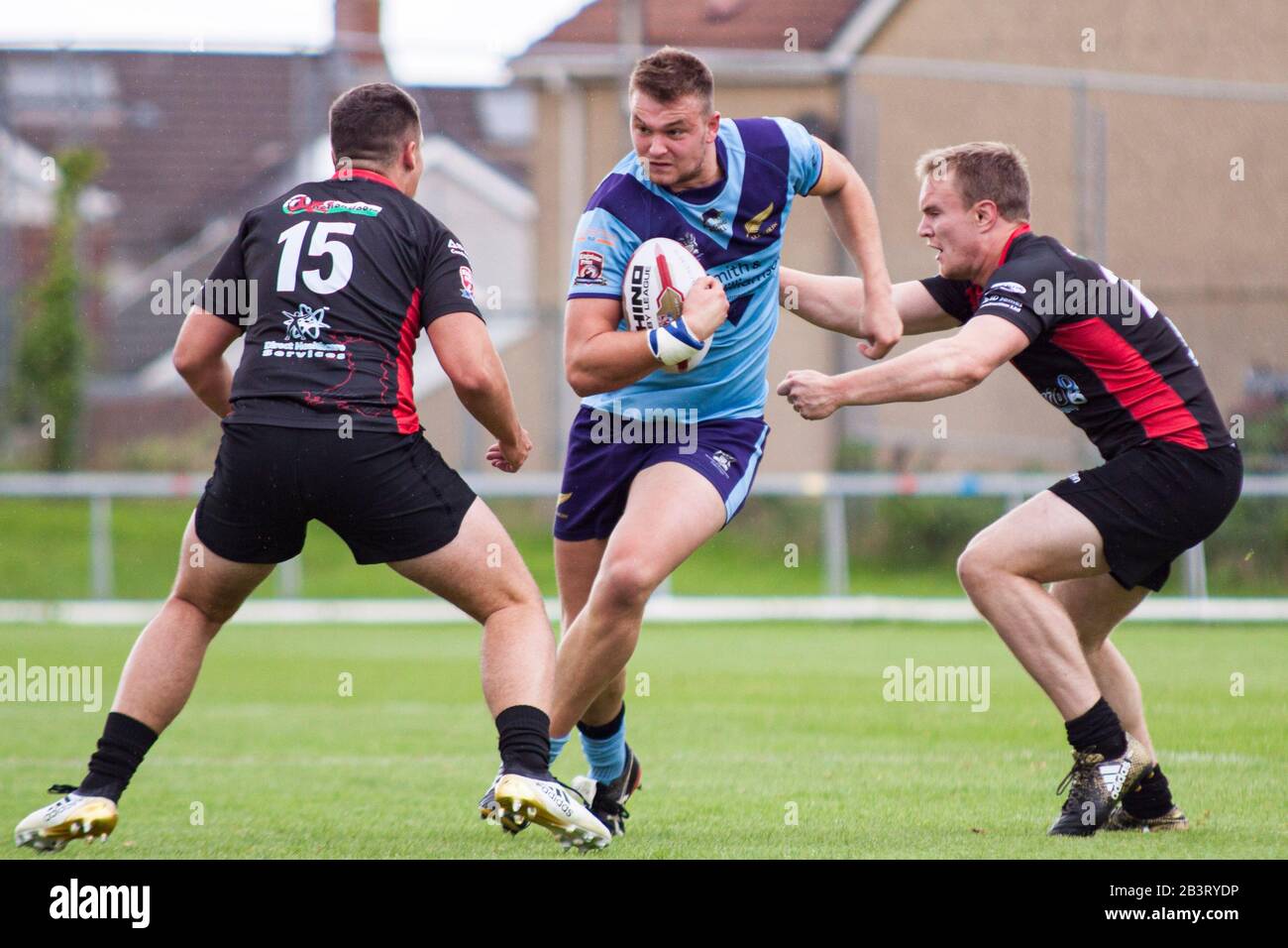Harry Kidd of the All Golds in action against the South Wales Ironmen. Stock Photo