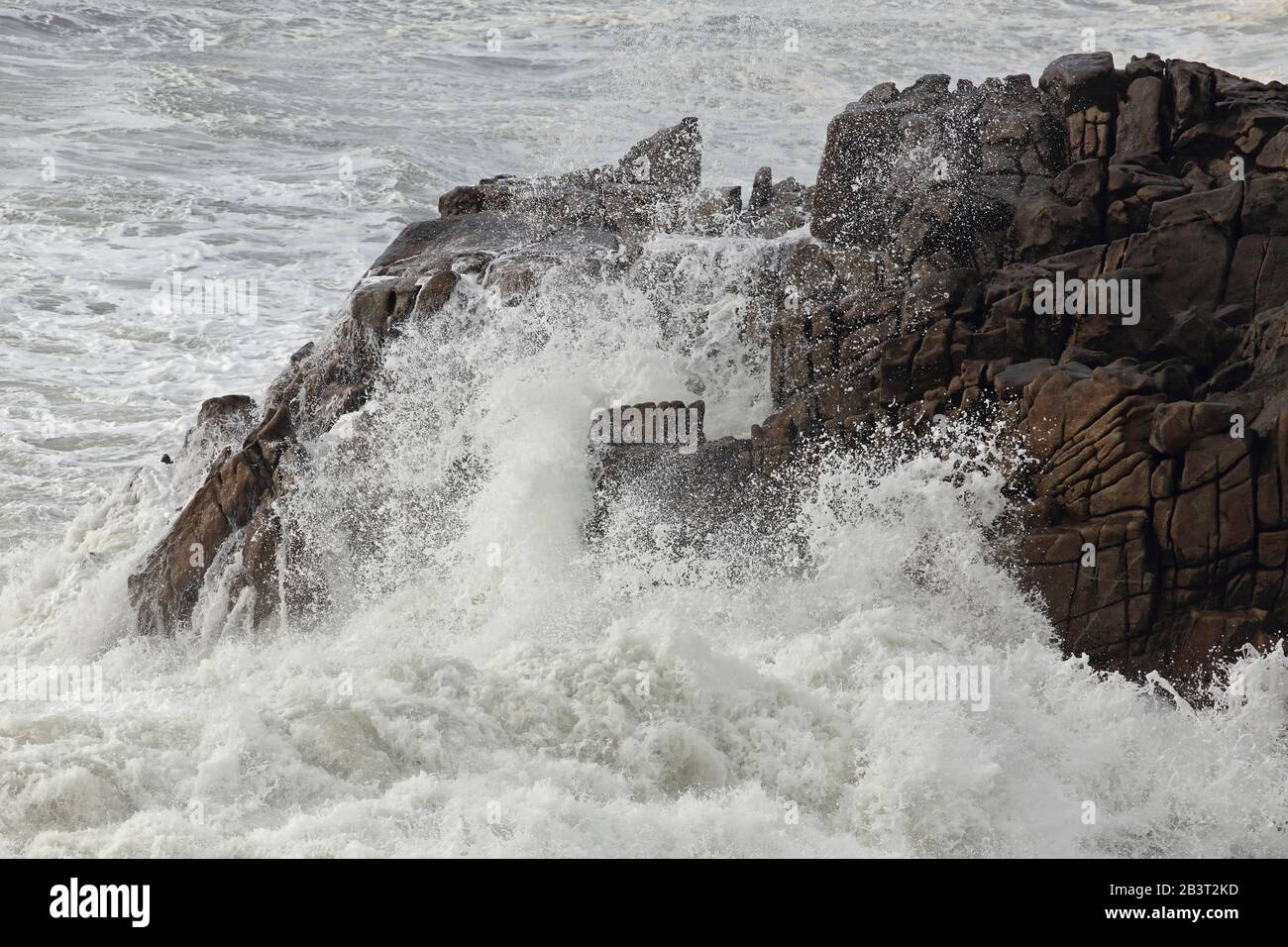 Little Cape of Sao Paio, northern Portugal, hit by storm waves Stock Photo