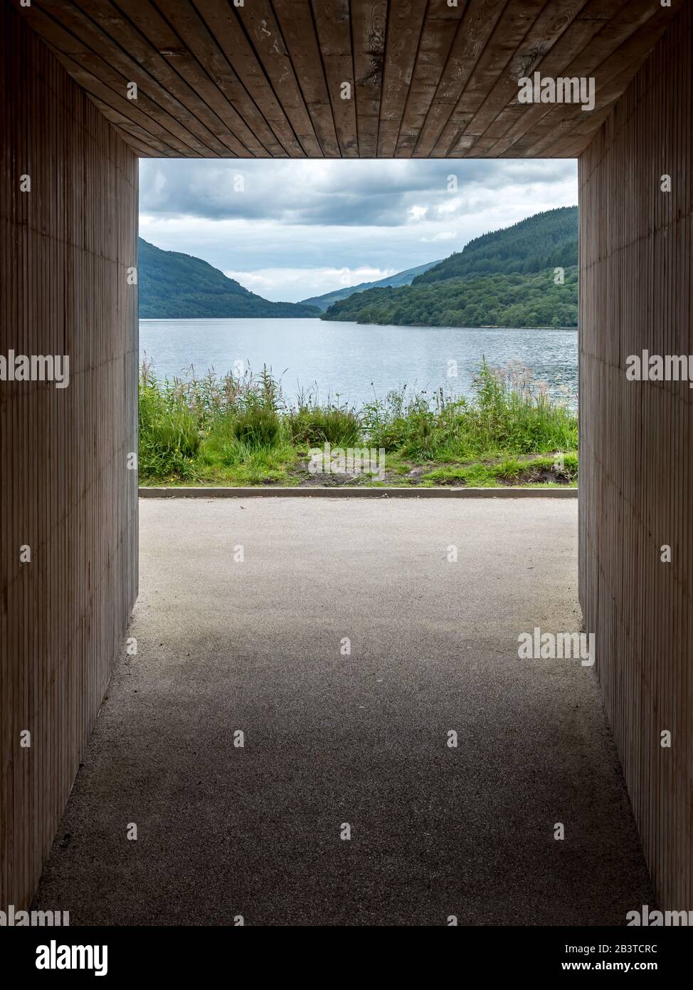 Inveruglas Pyramid viewing platform, Loch Lomond, Scotland. A view of the famous Scottish Loch framed by the viewing platform. Stock Photo