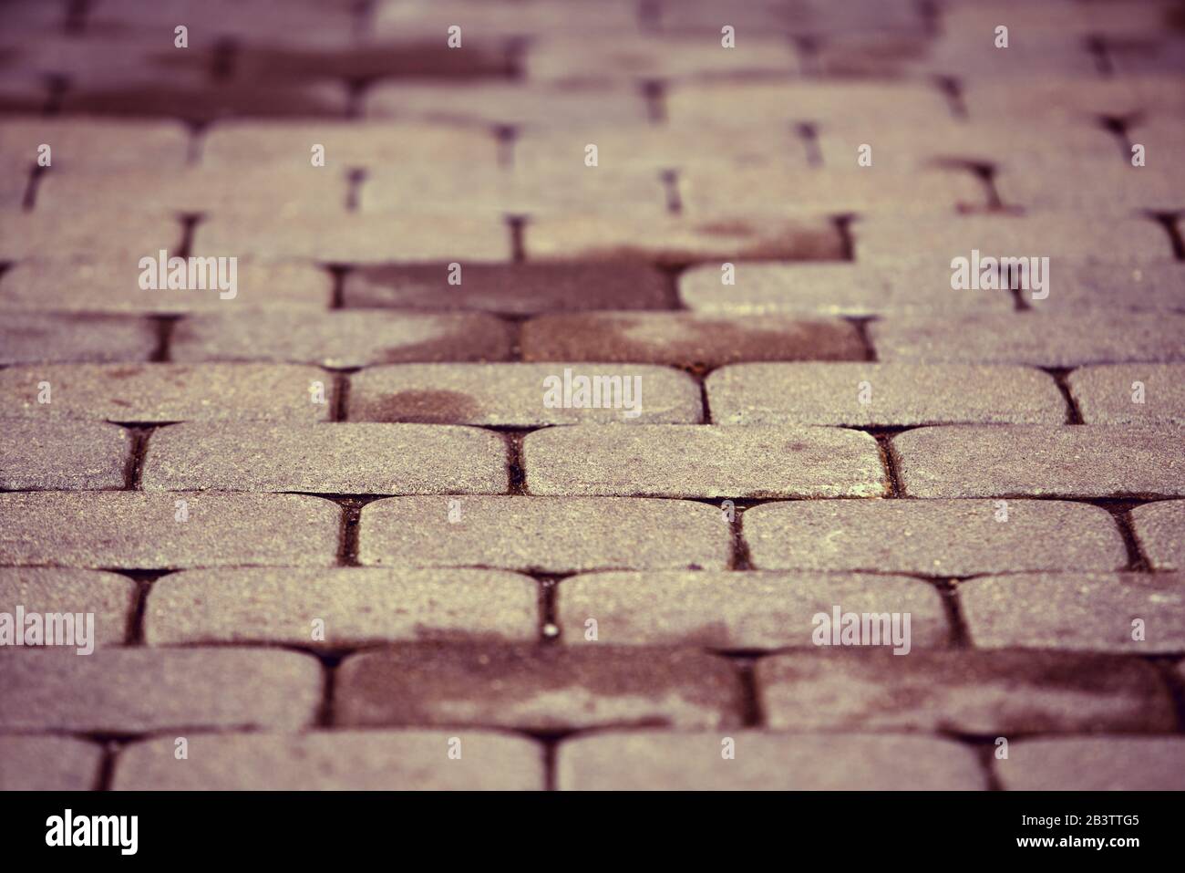 abstract background of cobble stone road making from cement blocks ...