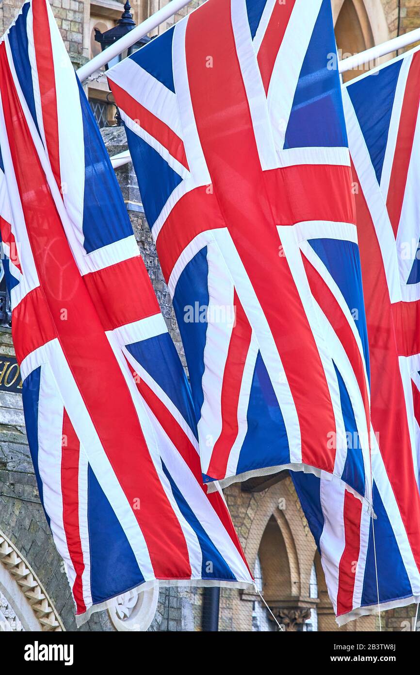 Trio of union jack flags outside the Randoph hotel, Oxford, England. Stock Photo