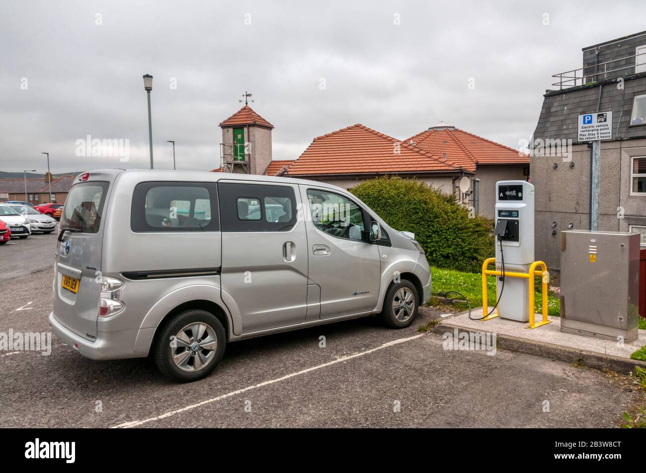 A Nissan e-nv200 electric van charging at an evolt charging station in Lerwick, Shetland. Stock Photo