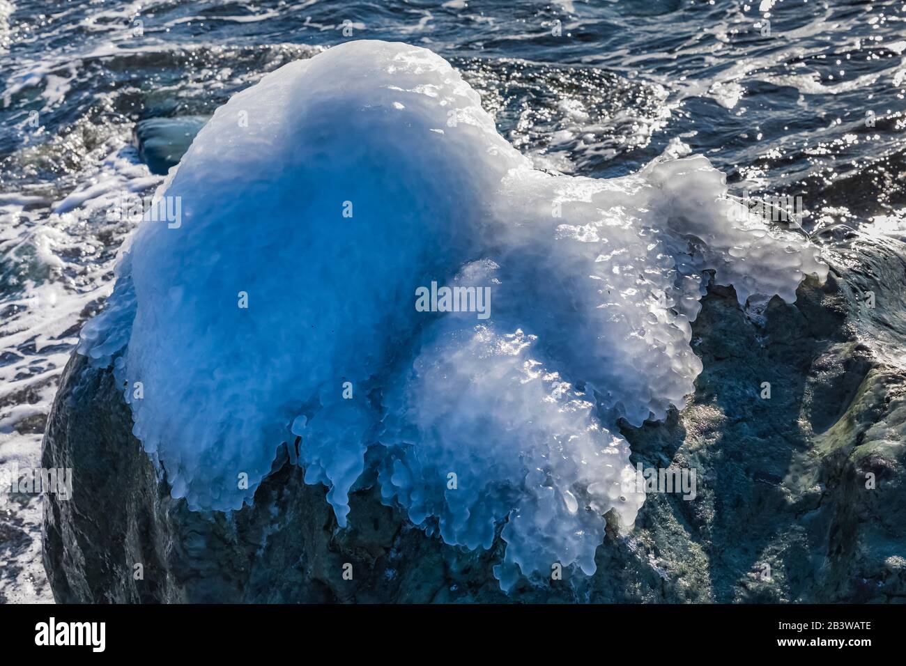 Ice formed by waves splashing against the shore along the Avalon