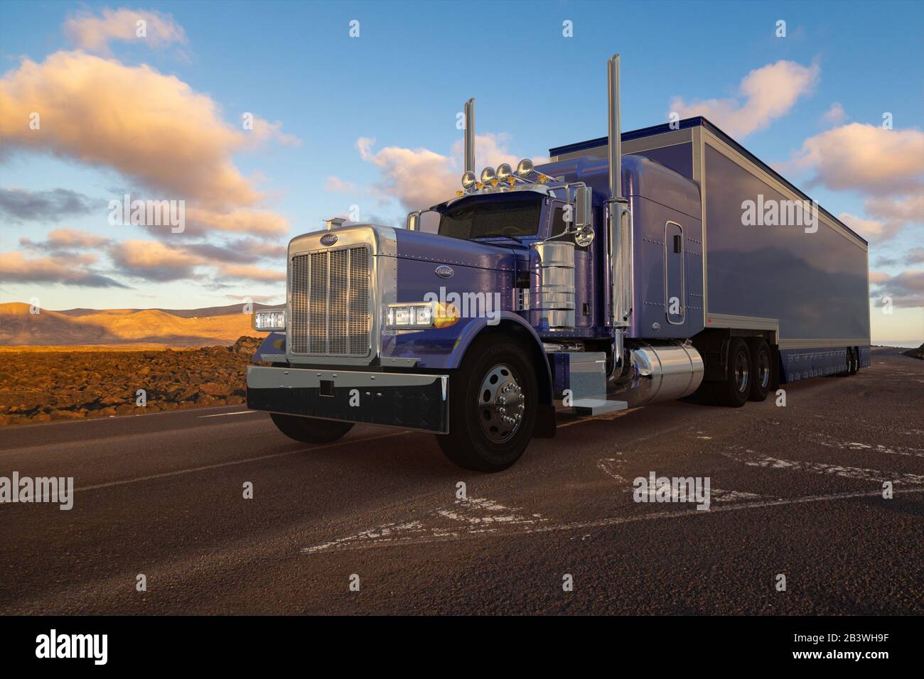 American Peterbilt truck with a semi-trailer driven on a desert road Stock Photo