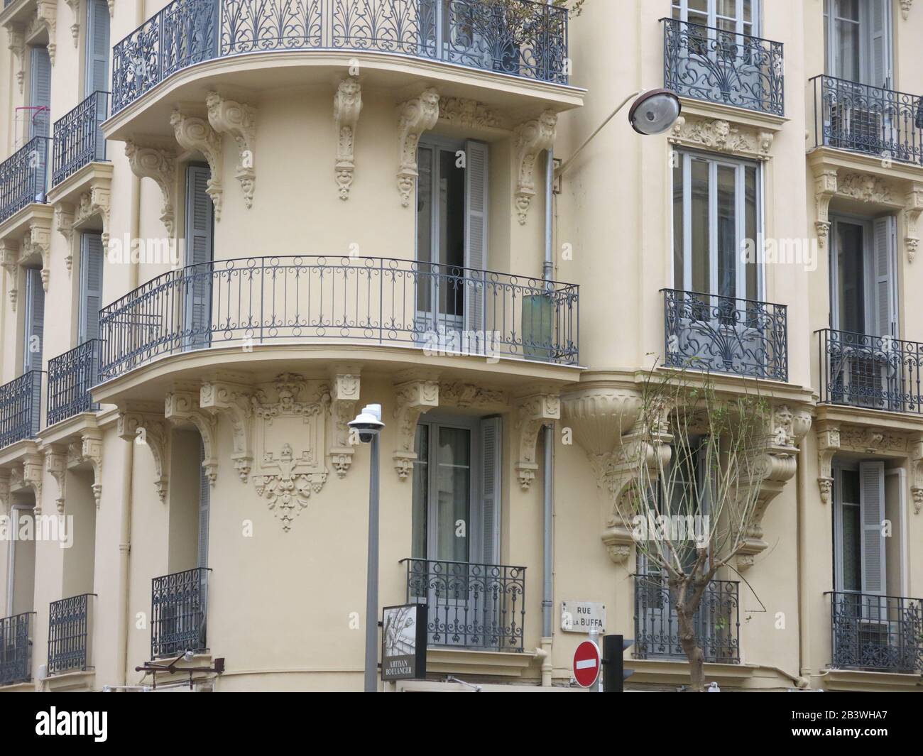 Mediterranean Window Railing A Mediterranean style of architecture with wooden shutters at all the ...