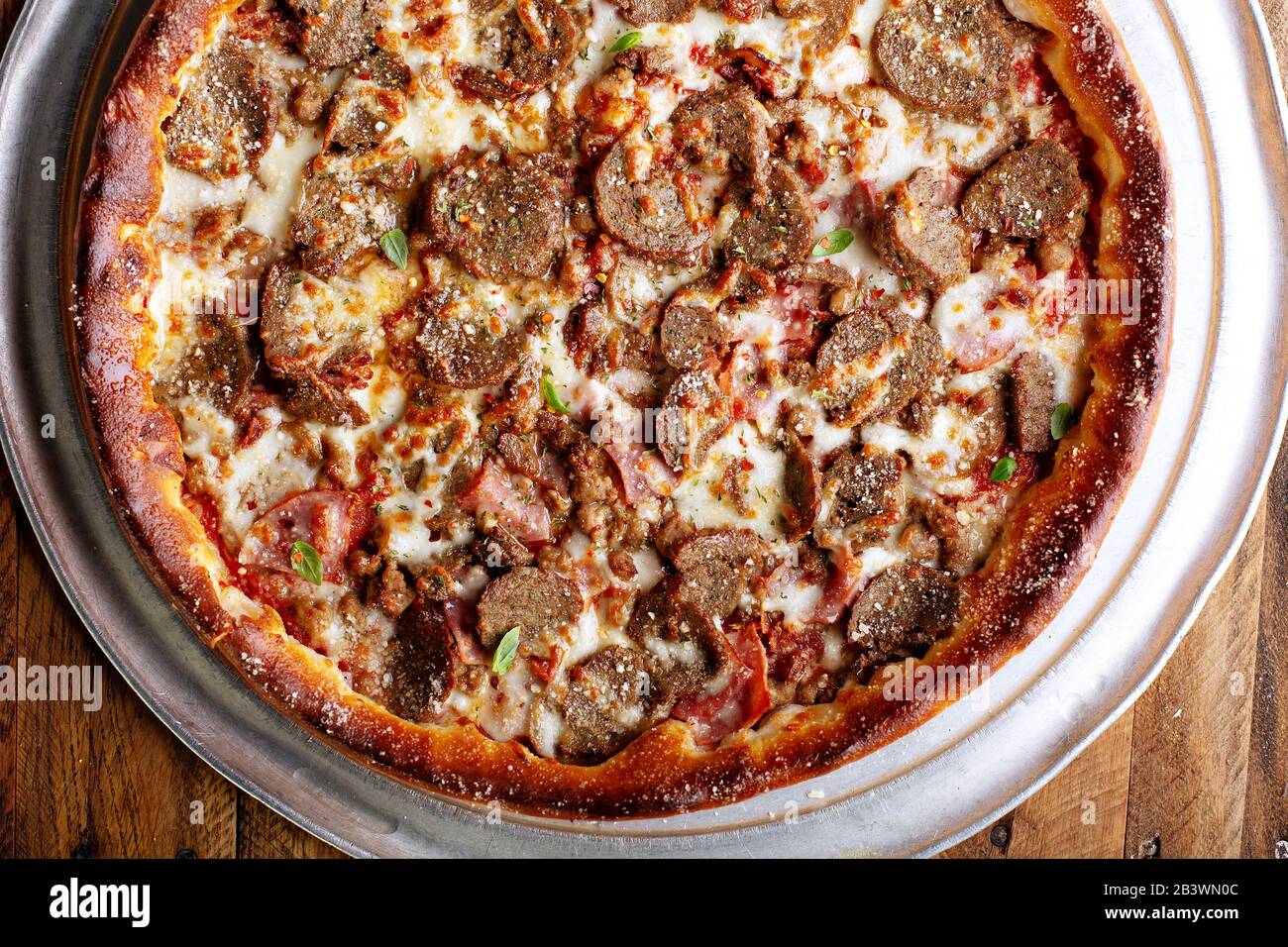 Deep dish pizza slice hires stock photography and images Alamy