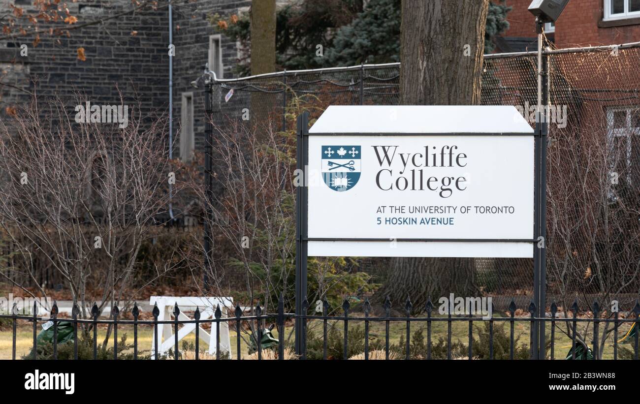 Wycliffe College (at the University of Toronto) logo on a sign out-front of campus in downtown Toronto. Stock Photo