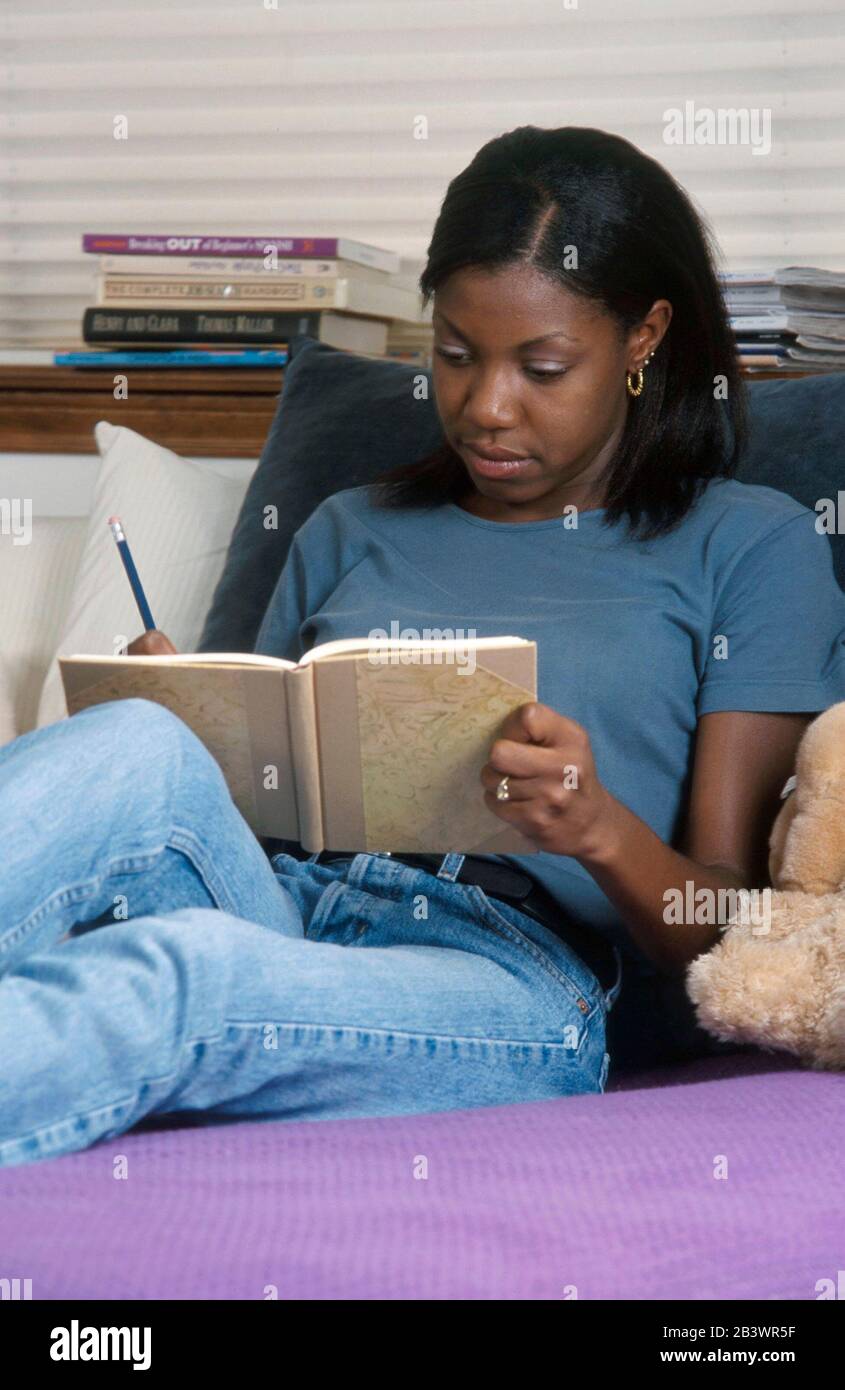 Austin Texas African American 18 Year Old Writing In Her Diary ©bob